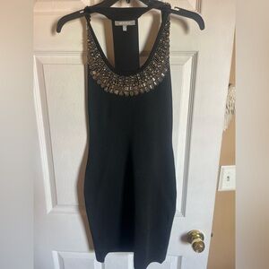 Elegant Black Dress with Embellished Neckline
